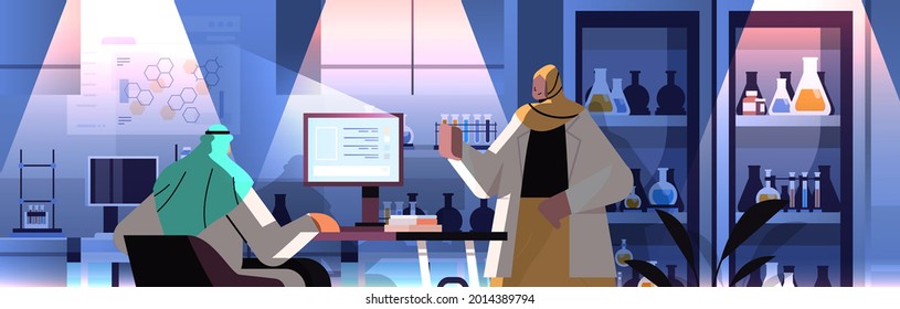 Arab Researchers Team Working On Computer And Making Chemical Experiments In Laboratory Molecular Engineering