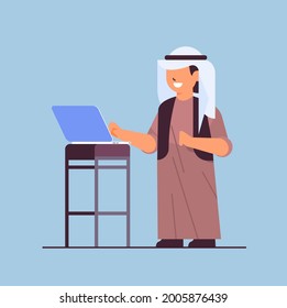 arab schoolboy using laptop smiling boy with gadget education concept