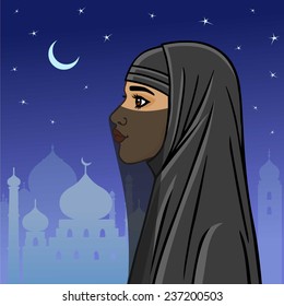 Arab woman in a niqab on a the night city background.