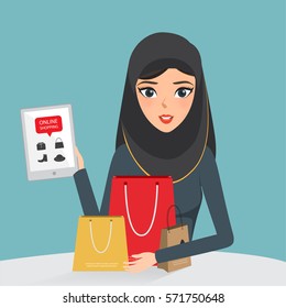 Arab Woman Shopping Online With A Mobile Or Tablet. Business Concept Marketting Design Vector.