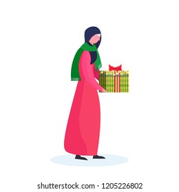 arab woman traditional clothes holding gift box happy new year merry christmas concept arabic female cartoon character profile full length isolated vector illustration