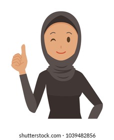 An arab woman wearing ethnic costumes is showing thumbs up
