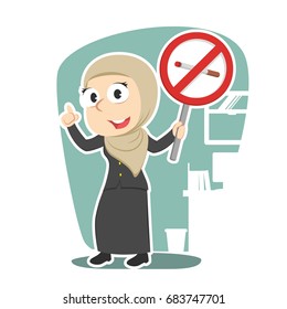 arabian businesswoman holding no smoking sign