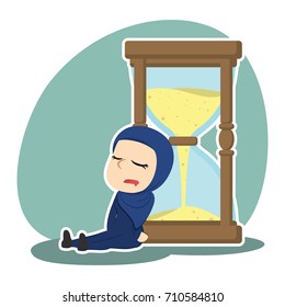 arabian businesswoman is sleeping on hourglass