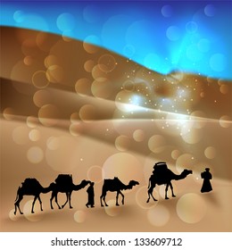 Arabian desert with camel caravan