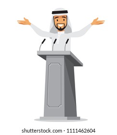 Arabic businessman standing at tribune with microphones making a speech. Orator or narrator, spokesman or leader at debates or presentation for audience. Business meeting or conference theme