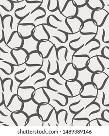 Arabic Calligraphy elements seamless repeat vector pattern swatch in brown and cream.  Traditional letters arranged in an ornamental style.  Islamic Arab alphabet compositioon.