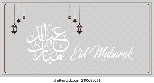 Arabic calligraphy and an islamic crescent moon for Eid Mubarak. Eid Mubarak design with creative design ornament. Golden luxury ornamental background with islamic patten and decorative ornament.