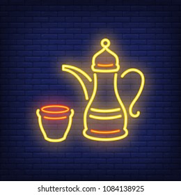 Arabic coffee neon sign. Traditional coffee pot symbolizing hospitality. Night bright advertisement. Vector illustration in neon style for cafe or restaurant