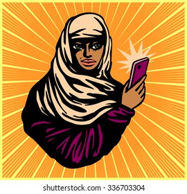 Arabic girl with hijab veil taking selfie photo with smartphone camera