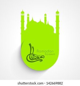 Arabic Islamic calligraphy of text Ramadan Kareem on green mosques.
