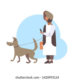 arabic man walking with dog arab character in traditional clothes using smartphone male person having fun with his animal pet best friend concept flat full length