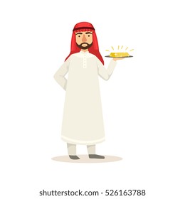 Arabic Muslim Businessman Dressed In Traditional Thwab Clothes And Wearing Headdress Kufiya Working In Financial Business Sphere Holding Gold Bar On Plate