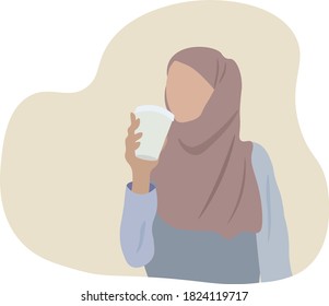 arabic muslim emirati or saudi  woman in hijab drinking coffee holding cup of coffee from united arab emirates student on the break time 