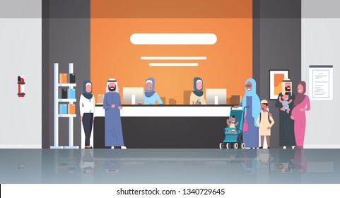 arabic patients in hijab standing line queue at hospital reception desk medical doctors consultation healthcare concept waiting hall clinic interior full length horizontal flat