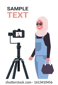 Arabic Woman Blogger Recording Video Blog With Digital Camera On Tripod Live Streaming Social Media Blogging Concept Portrait Vertical Copy Space Vector Illustration