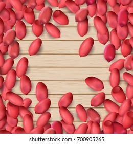 Arachis or peanuts background with red scattered nuts
