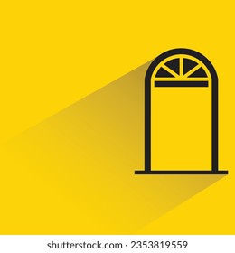 arch door with shadow on yellow background