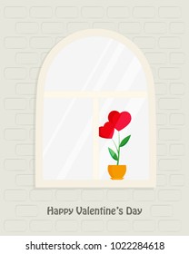 Arch window with red flower as heart in pot, greeting inscription on brick wall - Happy Valentine's Day, greeting card