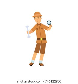 Archaeologist studying bone through magnifying glass