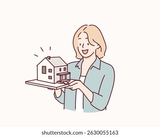 Arquiteto que possui um modelo de casa. Ilustrações de design de vetor de estilo desenhado à mão.