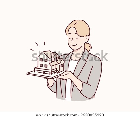 Architect Holding a House Model. Hand drawn style vector design illustrations.