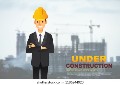 architect wearing hardhat on under construction site
