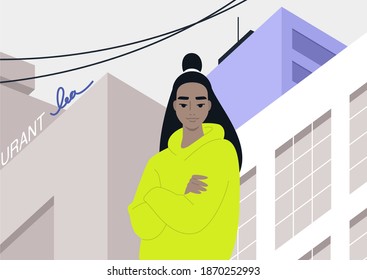 The architectural concept, a young female Asian character standing on the street in downtown, skyscrapers and city infrastructure