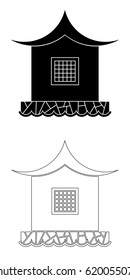 Architecture of the Far East. House in the eastern style  on a stone base near the water.