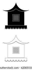 Architecture of the Far East. A house in the oriental style  on the ground near the water.