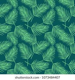  Arecaceae Coconut leaf seamless pattern. Green background for textile and fashion clothing. 