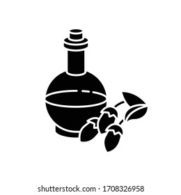 Argan oil black glyph icon. Organic nuts essence for dry and frizzy hair. Natural cosmetic product for haircare treatment. Silhouette symbol on white space. Vector isolated illustration
