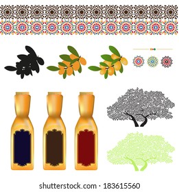 Argan oil elements, bottles with labels and Argan tree