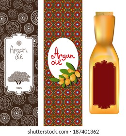 Argan oil elements, bottles with labels and Argan tree