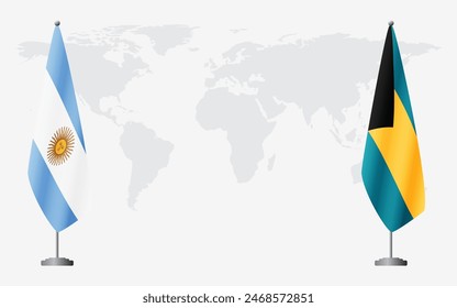 Argentina and Bahamas flags for official meeting against background of world map.