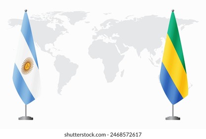 Argentina and Gabon flags for official meeting against background of world map.