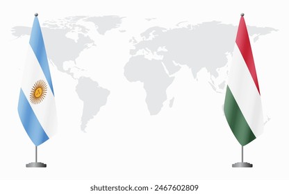 Argentina and Hungary flags for official meeting against background of world map.