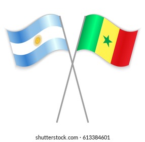 Argentine and Senegalese crossed flags. Argentina combined with Senegal isolated on white. Language learning, international business or travel concept.