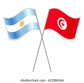 Argentine and Tunisian crossed flags. Argentina combined with Tunisia isolated on white. Language learning, international business or travel concept.