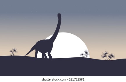 argentinosaurus on the hill scenery silhouettes