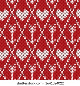 Argyle with heart and arrow knitted seamless pattern. Red and white jacquard background. Vector illustration.