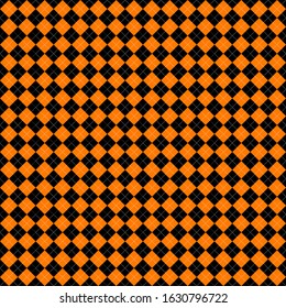 Argyle plaid. Scottish pattern in orange,white and black rhombuses. Scottish cage. Seamless fabric texture. Halloween Background.