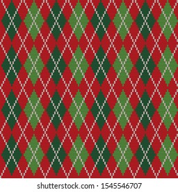Argyle print. Christmas background. Seamless knitted pattern with rhombuses. Checkered background in red and green colors. Vector illustration