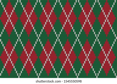 Argyle print. Christmas background. Seamless knitted pattern with rhombuses. Checkered background in green and red colors. Vector illustration