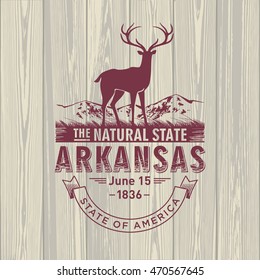 Arkansas, stylized emblem of the state of America, deer, on wooden background