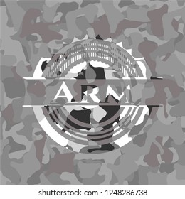 Arm on grey camo texture