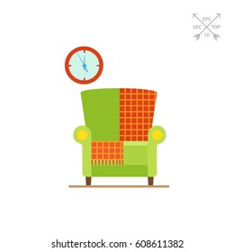 Armchair with checkered rug