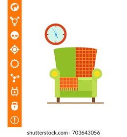 Armchair with checkered rug