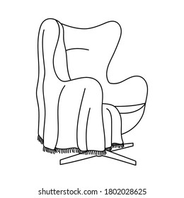 Armchair and plaid. Black and white vector illustration in doodle style.