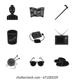 Armchair, slippers, tonometer and other attributes of old age.Old age set collection icons in black style vector symbol stock illustration web.